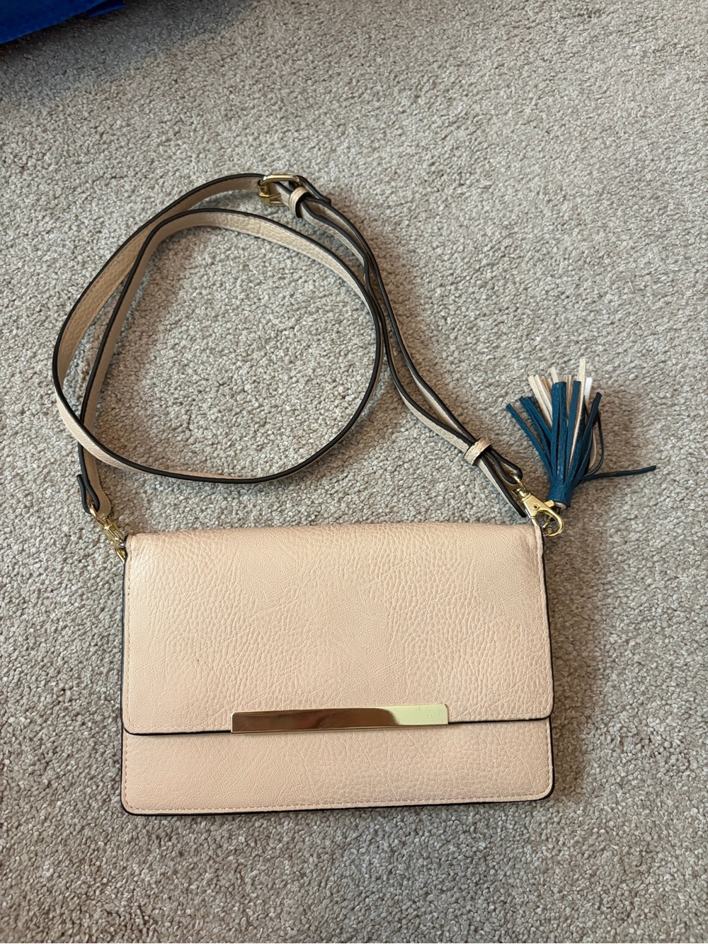 Women’s Cream Crossbody Bag with Tassel Accent
